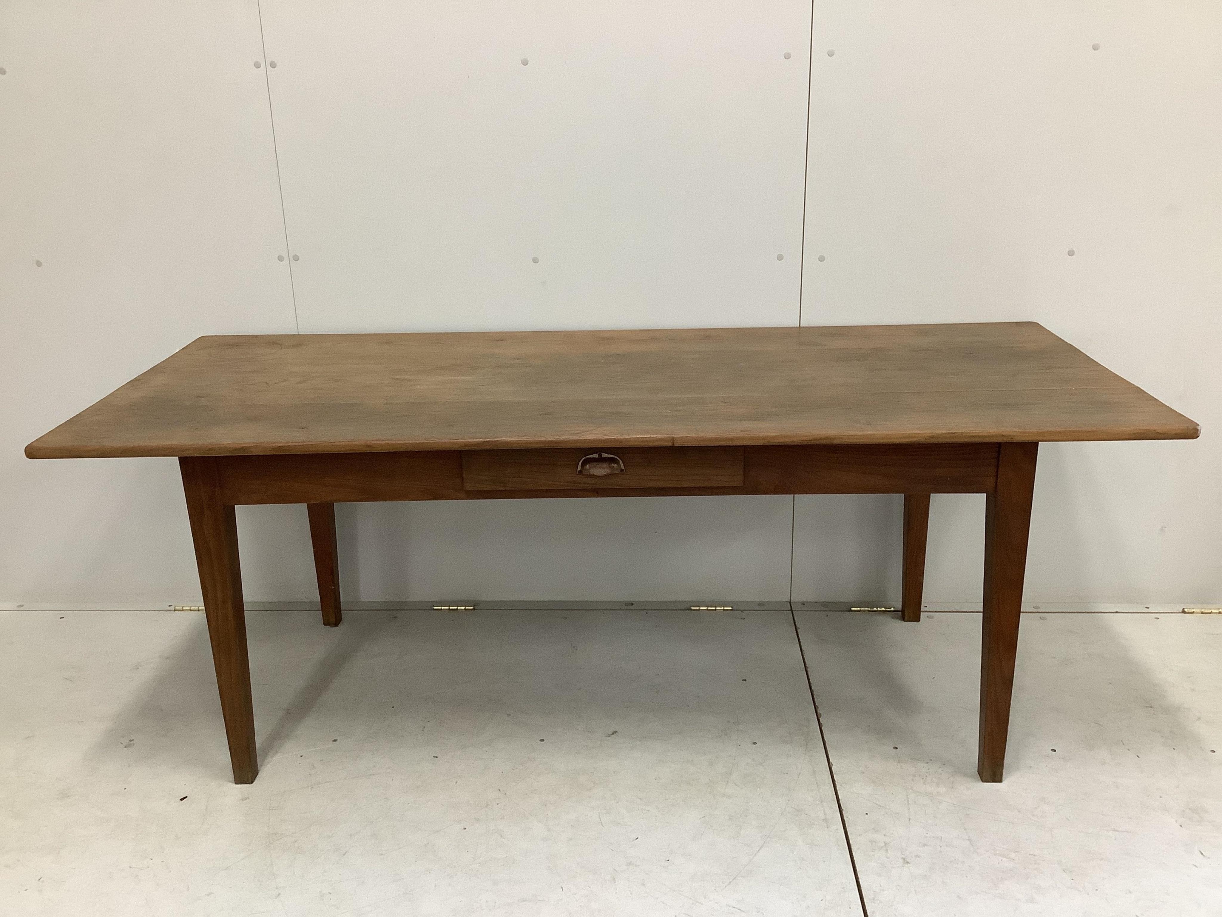 A 19th century French oak rectangular kitchen table, width 198cm, depth 82cm, height 73cm. Condition - fair